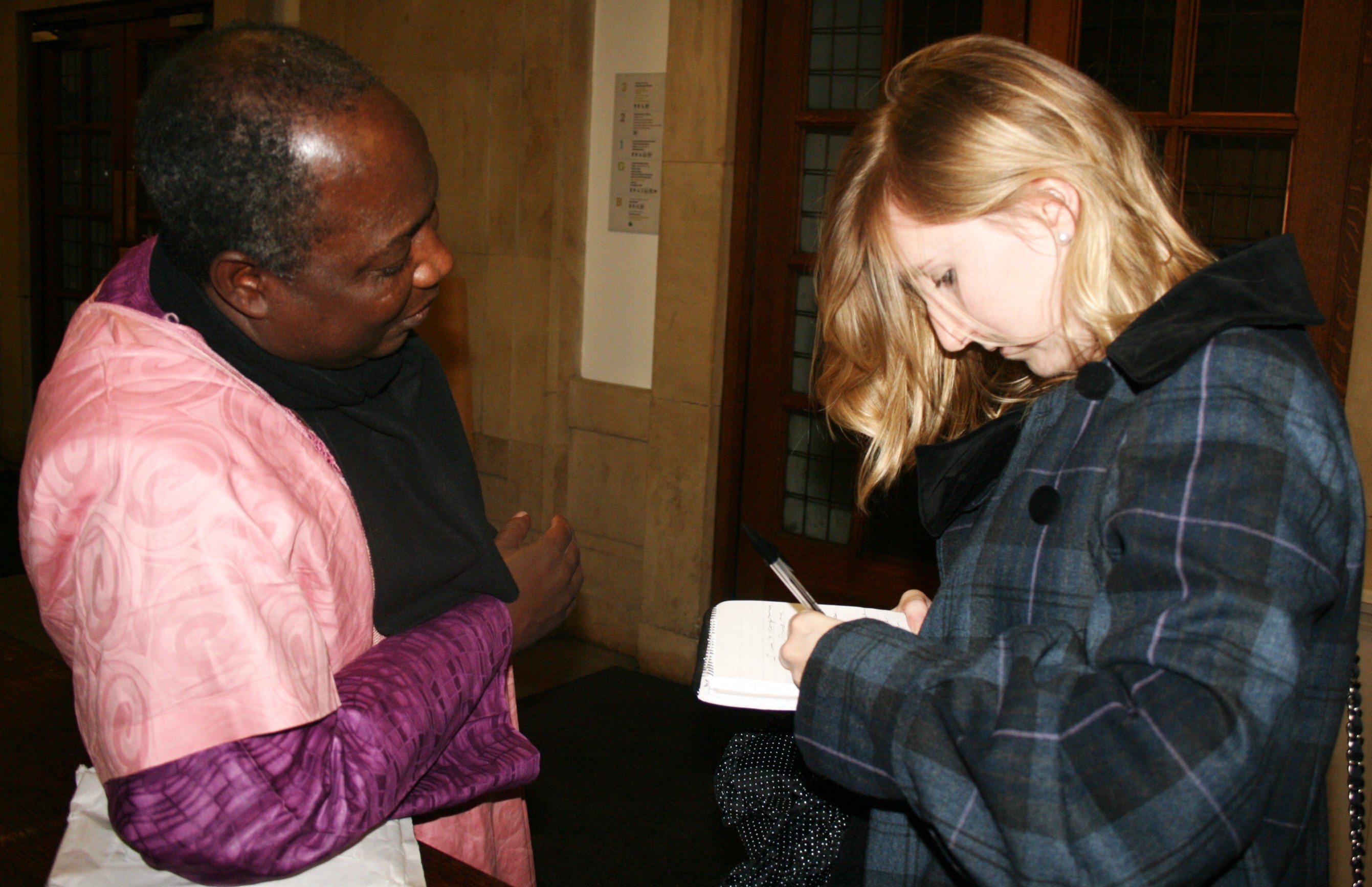 Francesca Holloway interviewing Imam Muhammad Ashafa (photo: Louise Jefferson)
