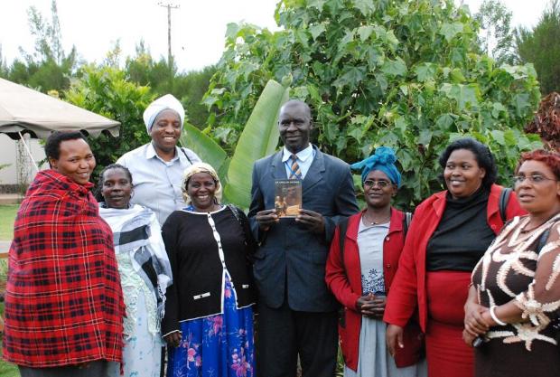 Reverend Evans Misigo, part of the Initiatives of Change team, together with a group of women who have recently participated in IofC’s Peace Circles, after the screening in Eldoret.