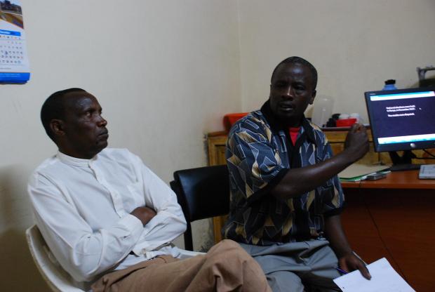 IofC worker Joseph Wainaina and Catholic Justice and Peace Commissioner Paul Keitany introduce a viewing of 'An African Answer' in the Rift Valley town of Kabarnet.