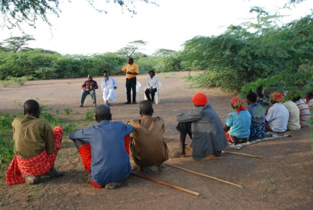 IofC project co-ordinator Joseph Karanja introduces Pastor James Wuye and Imam Muhammad Ashafa to a group of Ilchamus IDPs.