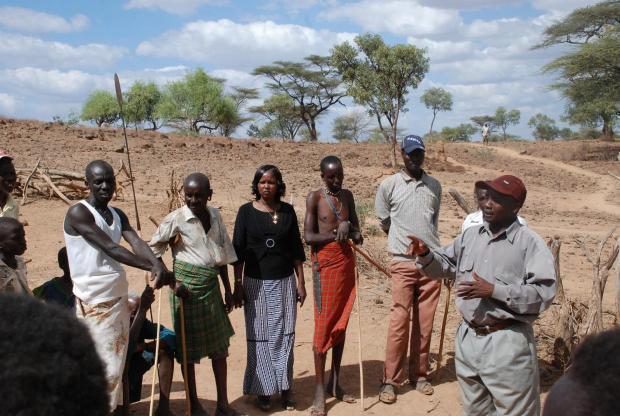 Paul Keitany (right) and Maryanne Ntausian (centre) ask Tugen elders for their thoughts on peace and conflict in the area