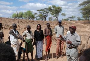 Paul Keitany (right) and Maryanne Ntausian (centre) ask Tugen elders for their thoughts on peace and conflict in the area (Photo: Alan Channer)