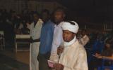 Youth line up to comment after an open-air screening of An African Answer in Abeche, eastern Chad