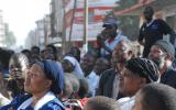 Residents of Eastleigh gather to listen to prayers and messages of peace at the scene of the blast