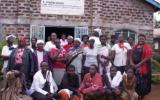 During a small group meeting, Joseph Wainaina (left) explains his part in coordinating the Peace Caravan in Eldoret