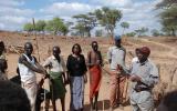 Paul Keitany (right) and Maryanne Ntausian (centre) ask Tugen elders for their thoughts on peace and conflict in the area