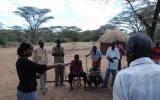 Maryann Ntausian asks a group of Njemps people, who lost all their cattle during a raid by another community, about their hopes for the future