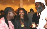 Pastor James Wuye, left, and Imam Muhammad Ashafa, right, with Wanjiku Kibunja from Kenya